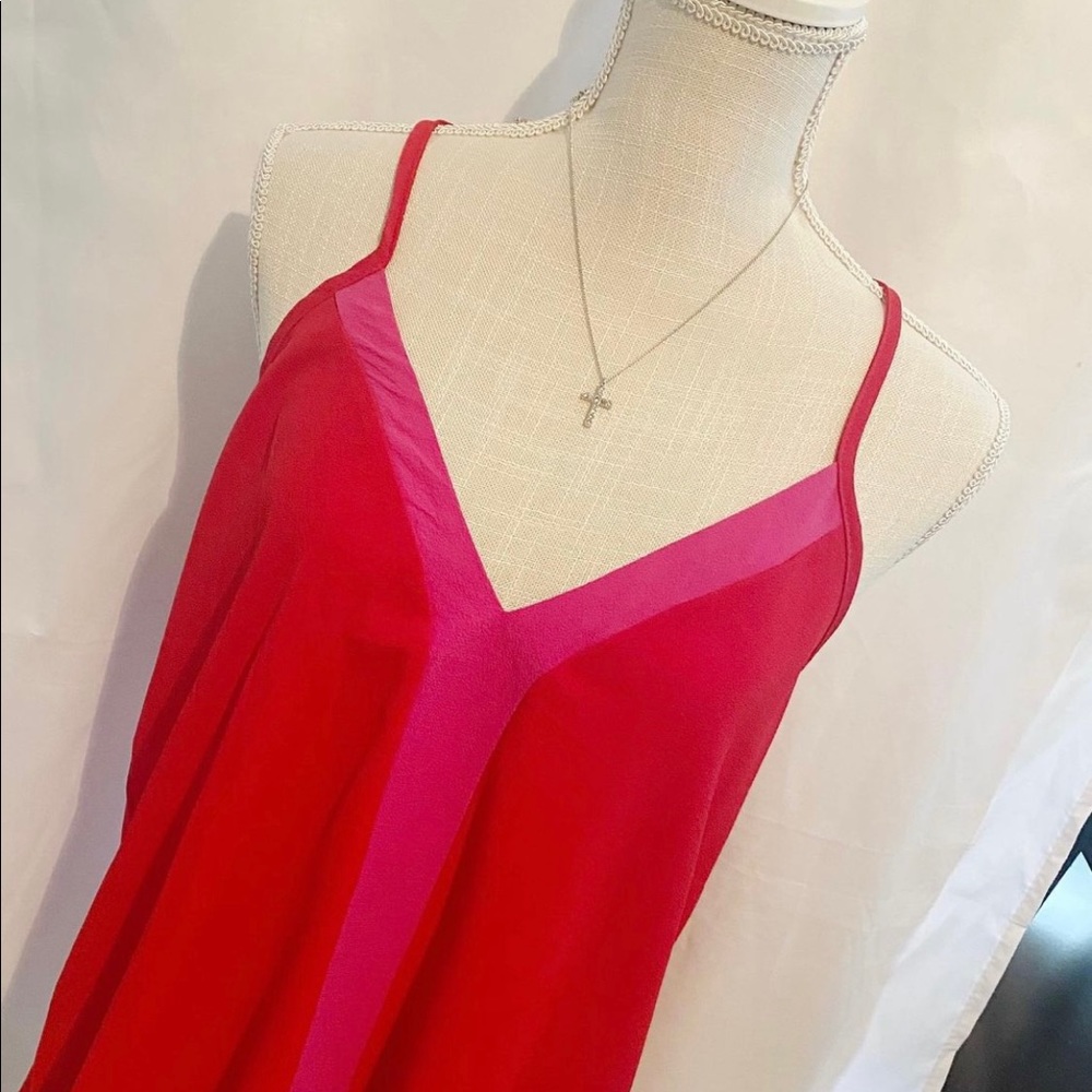 Red/Pink shirt.